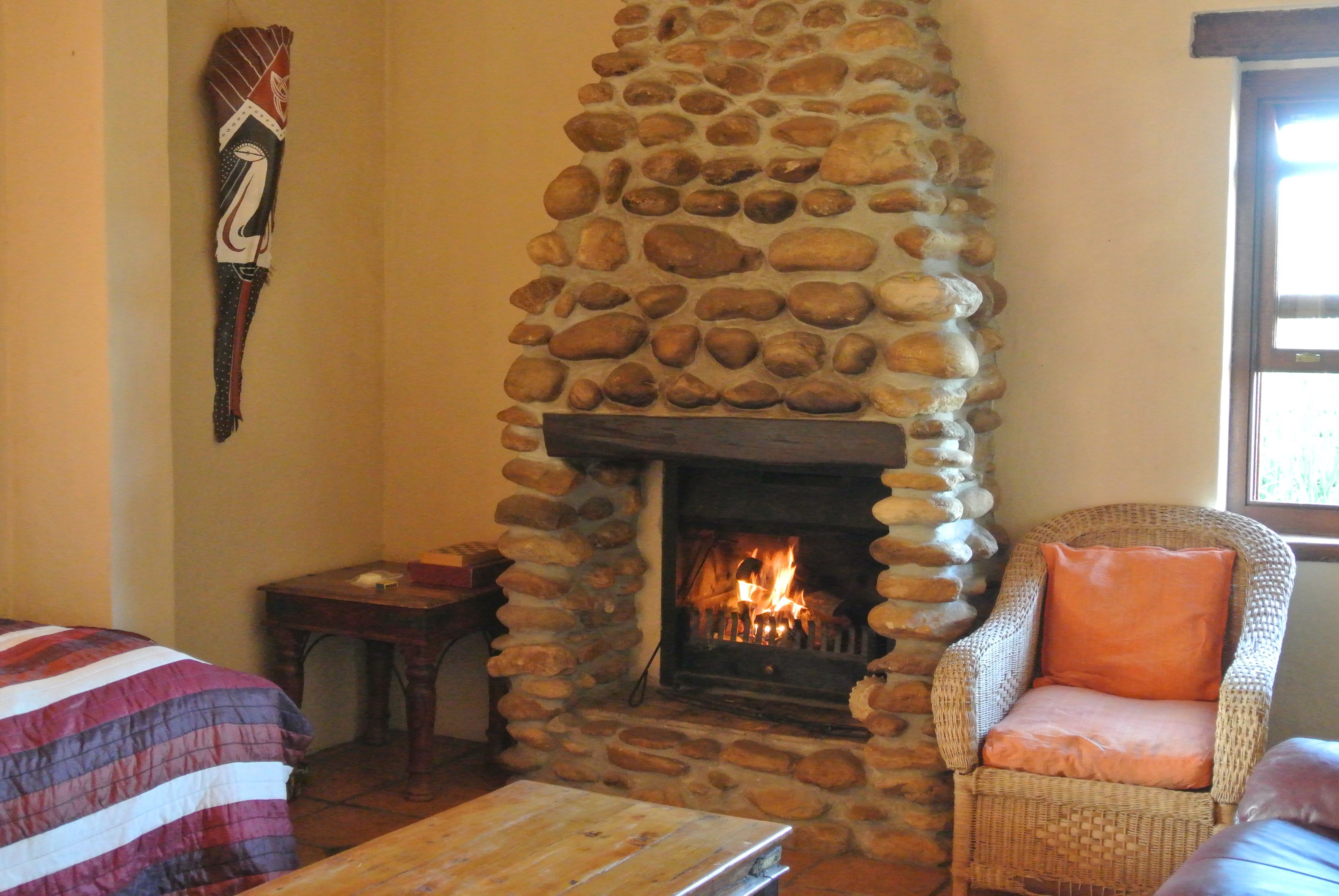 Fireplace in the lounge of the Klein Karoo Valley Guest Farm Cottage