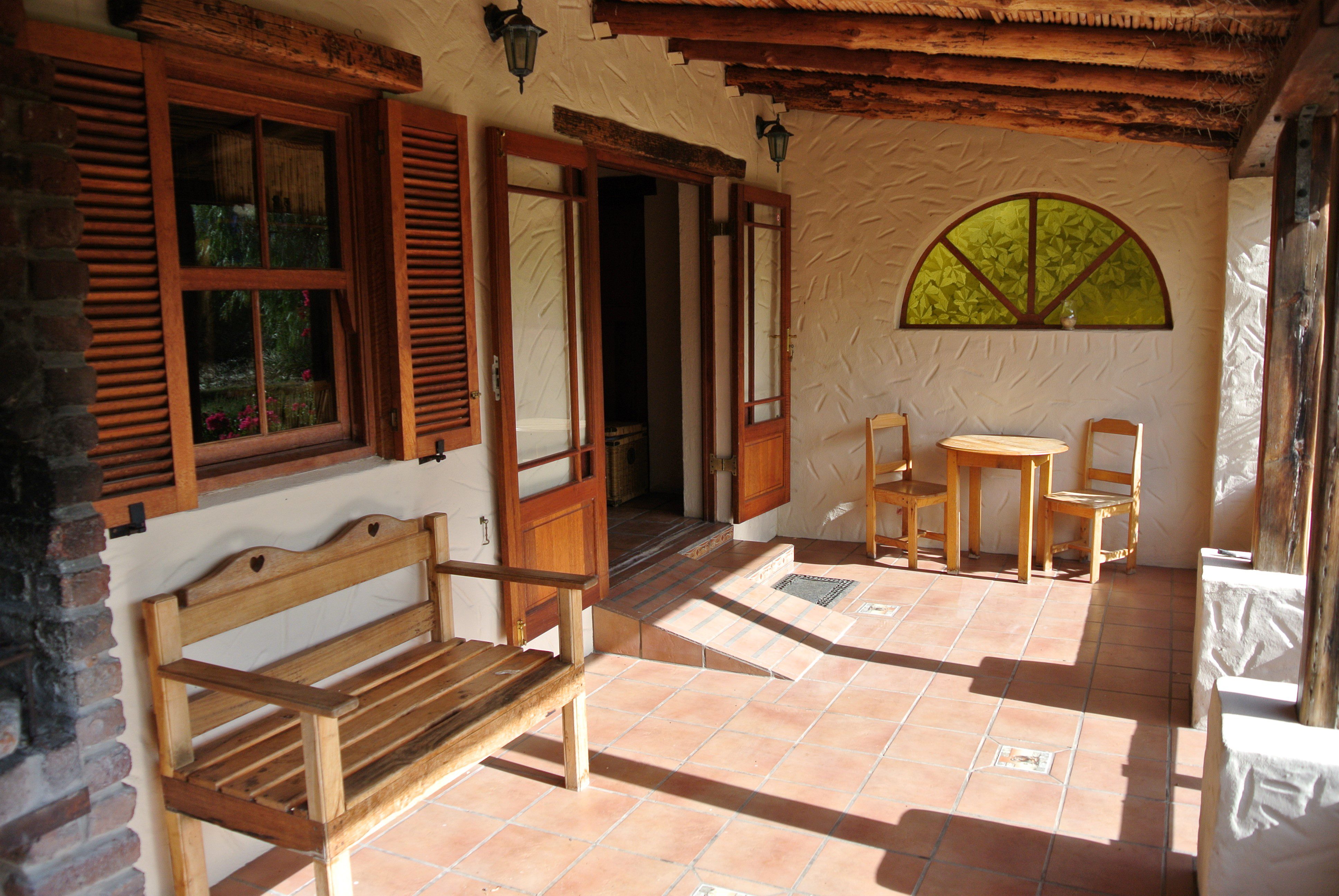 Stoep and Patio area with seating spots at the Klein Karoo Valley Guest Farm Cottage